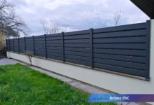 cloture-pvc-gris-anthracite-installee-sur-muret-magma